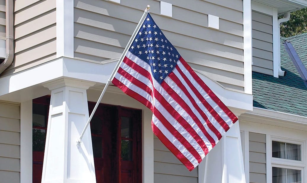 American Flag show on Tangle free flagpole on a house