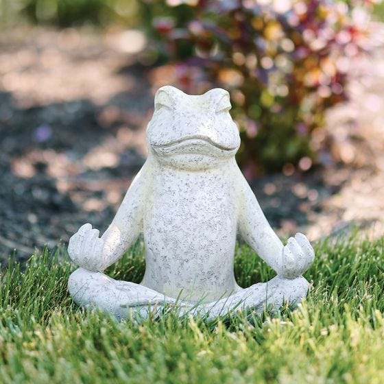 Meditating Frog Statue in grass 