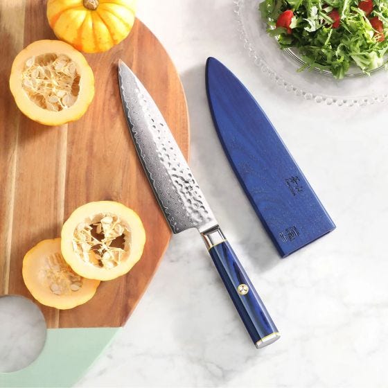 scene image of knife on cutting board scene image of knife on cutting board