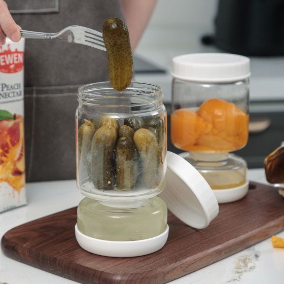 flip over jars with pickles and peaches inside 