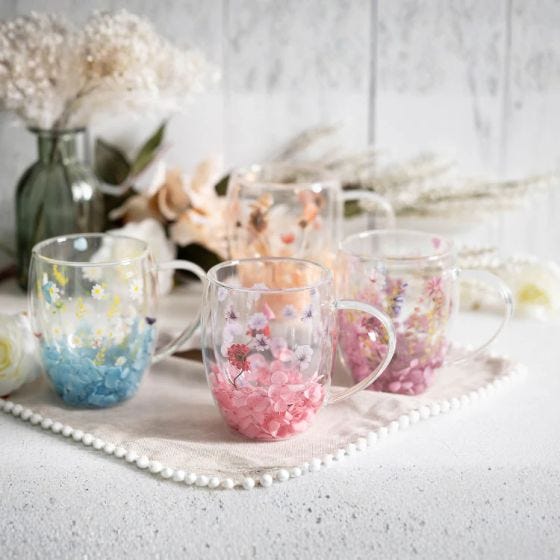 Double Wall Flower Mugs on table