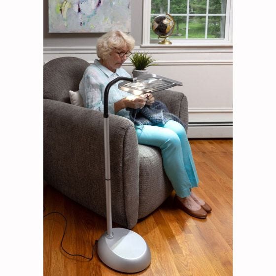 Magnifying Floor Lamp being used