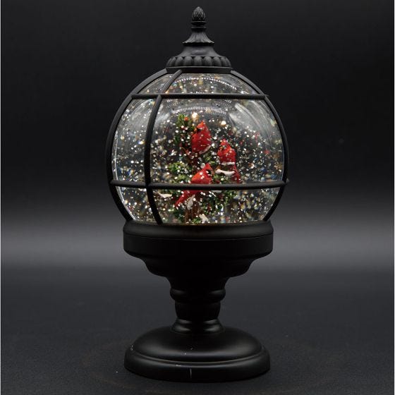 Victorian Cardinal Snow Globe on black Victorian Cardinal Snow Globe on black