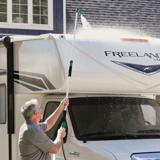 High Reach Water Blaster spraying van top