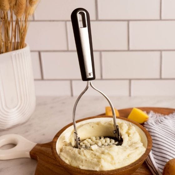 Potato Masher being used