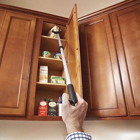 Easy Reacher being used in high cabinet in kitchen