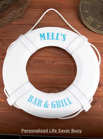 white Personalized Life Saver Buoy with blue lettering mels' bar and grill