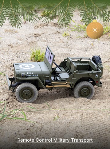 remote control military transport r/c car in sand setting outdoor
