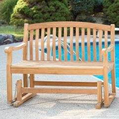 Teak Glider Bench outside by pool