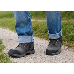 gray boots outside in gravel